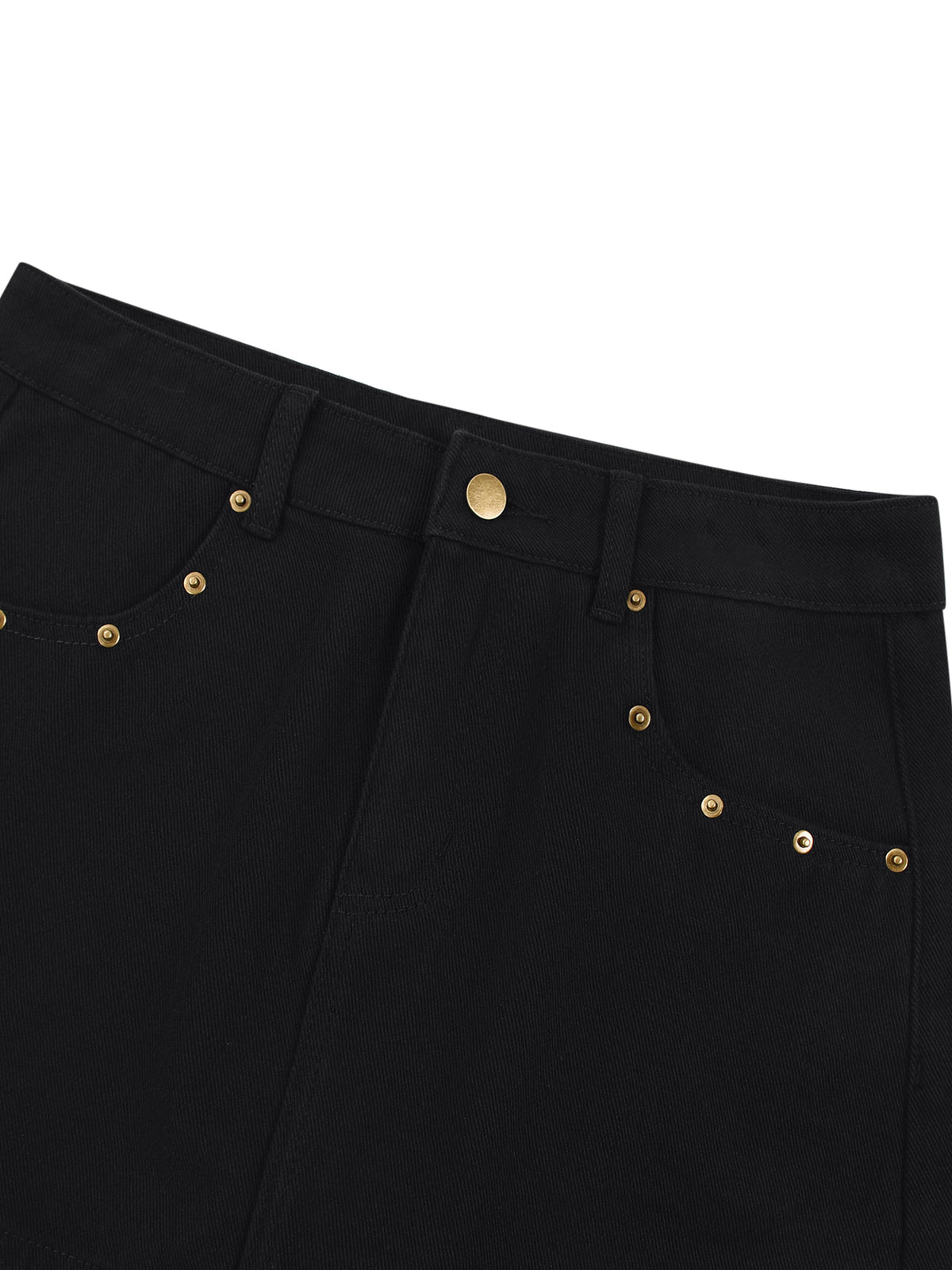     Close-up of gold-tone rivets and black denim construction on Pastels & Pistols mini skirt